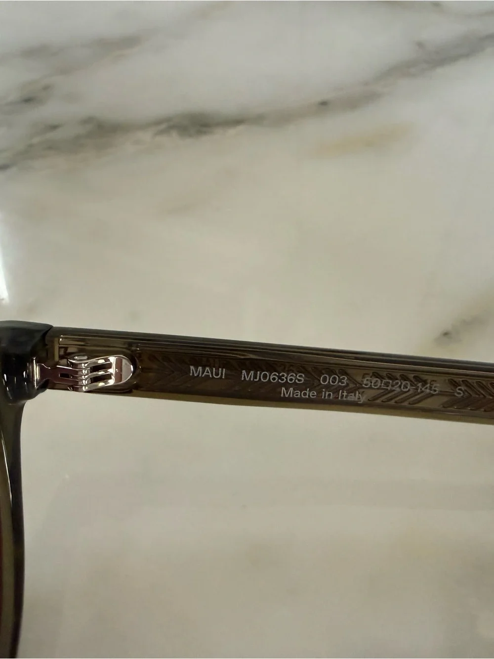 Maui Jim shiny trans green frame with Maui rose frame - polarized